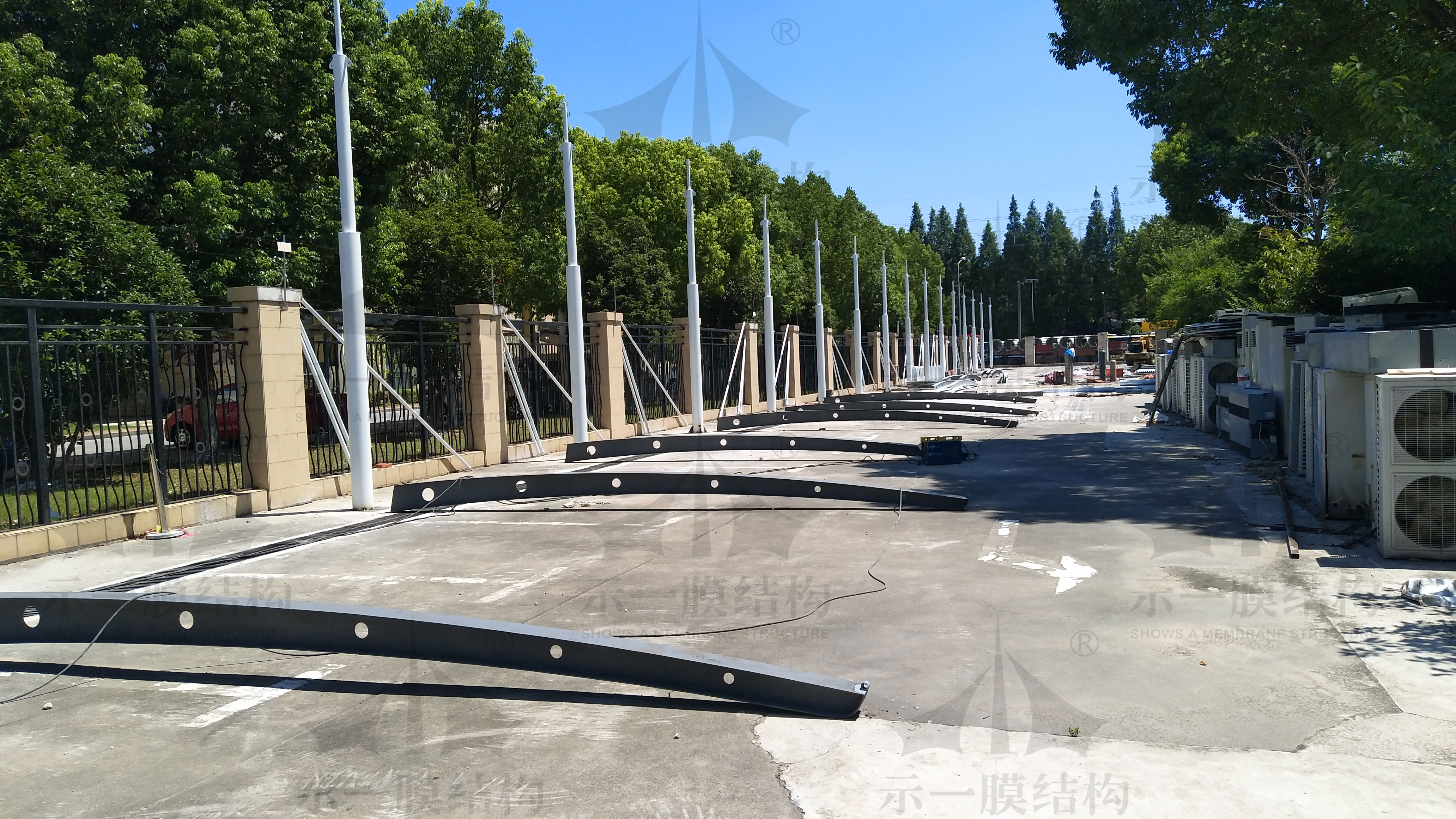 The membrane structure carport in summer will not disappoint